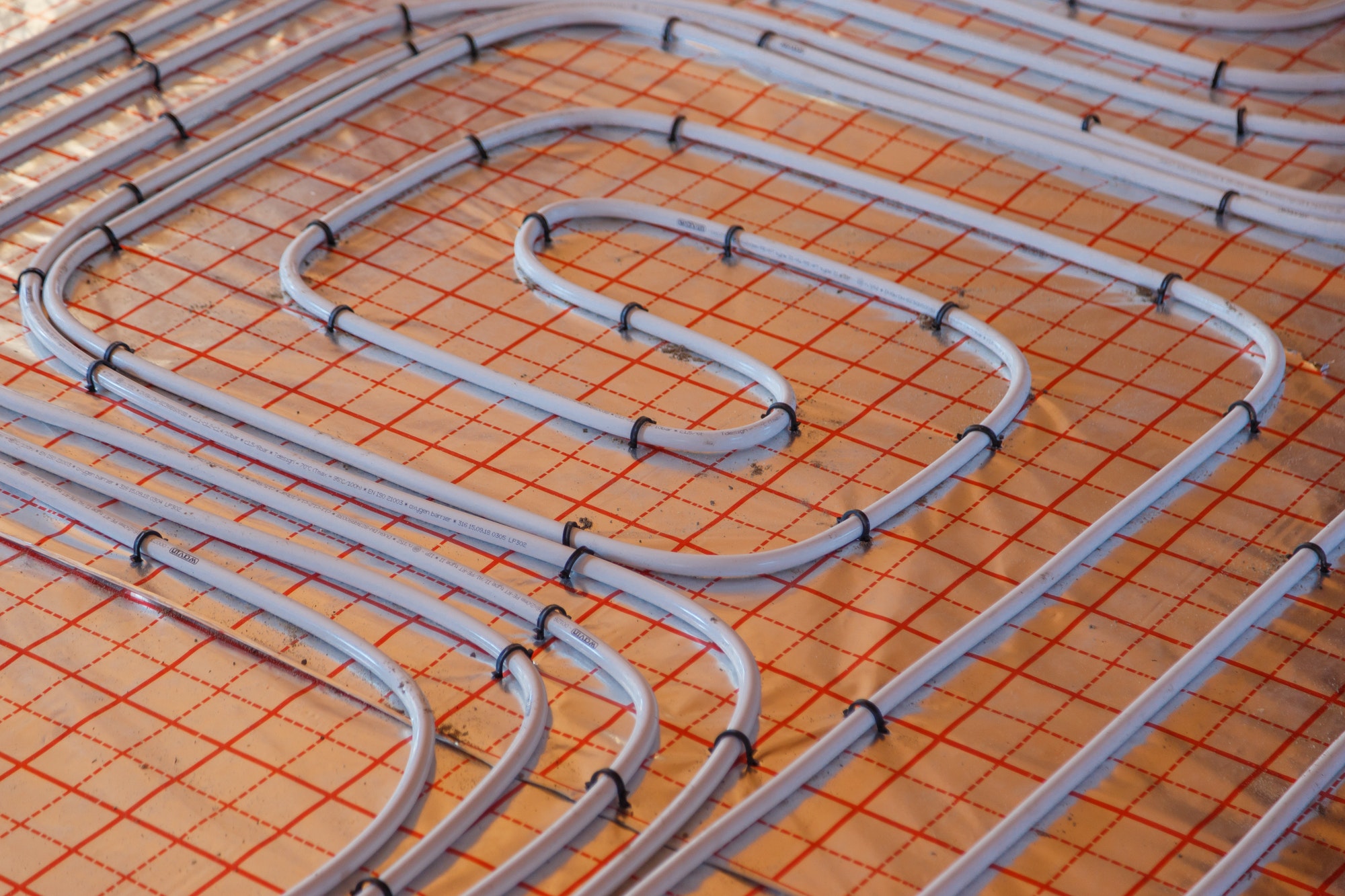 Underfloor surface heating pipes. Low temperature heating concept